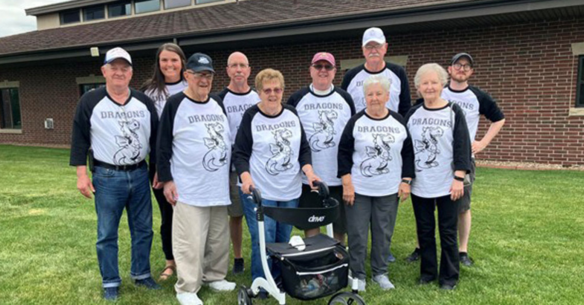 A group of beanbag baseball players smiling