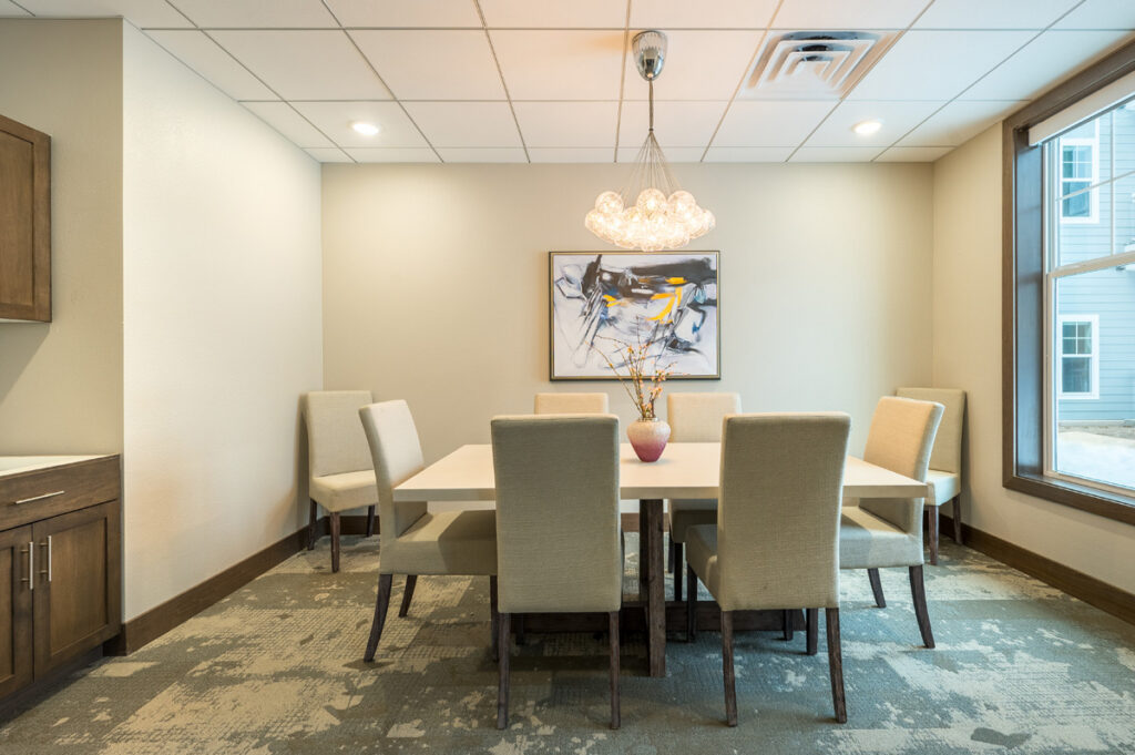 Private dining room at Meadowview of Johnston featuring elegant seating and a comfortable space for resident gatherings and family meals.